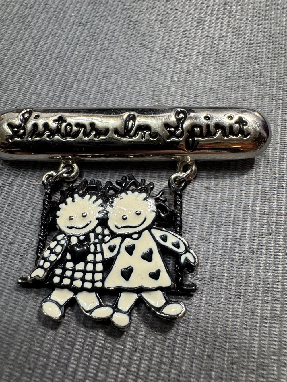 Source Unknown Silver "Sister In Spirit" Black and White Enamel Brooch